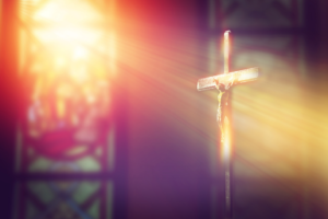 A cross in a ray of light